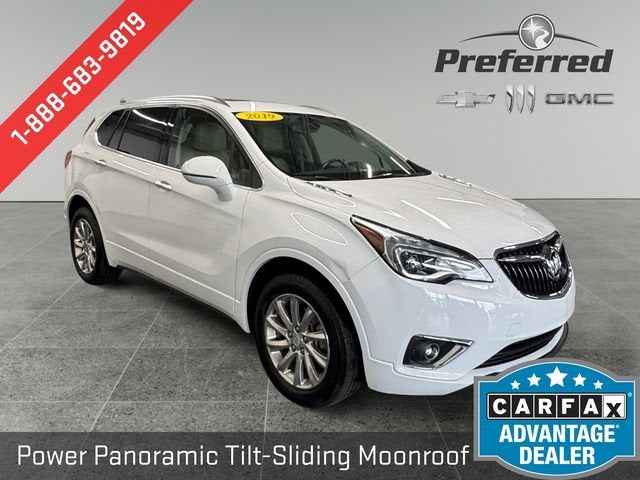 2019 Buick Envision Essence in Summit White — front three-quarter view