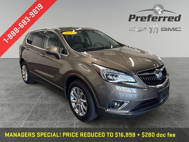 2019 Buick Envision Essence in Bronze Alloy Metallic — front three-quarter view